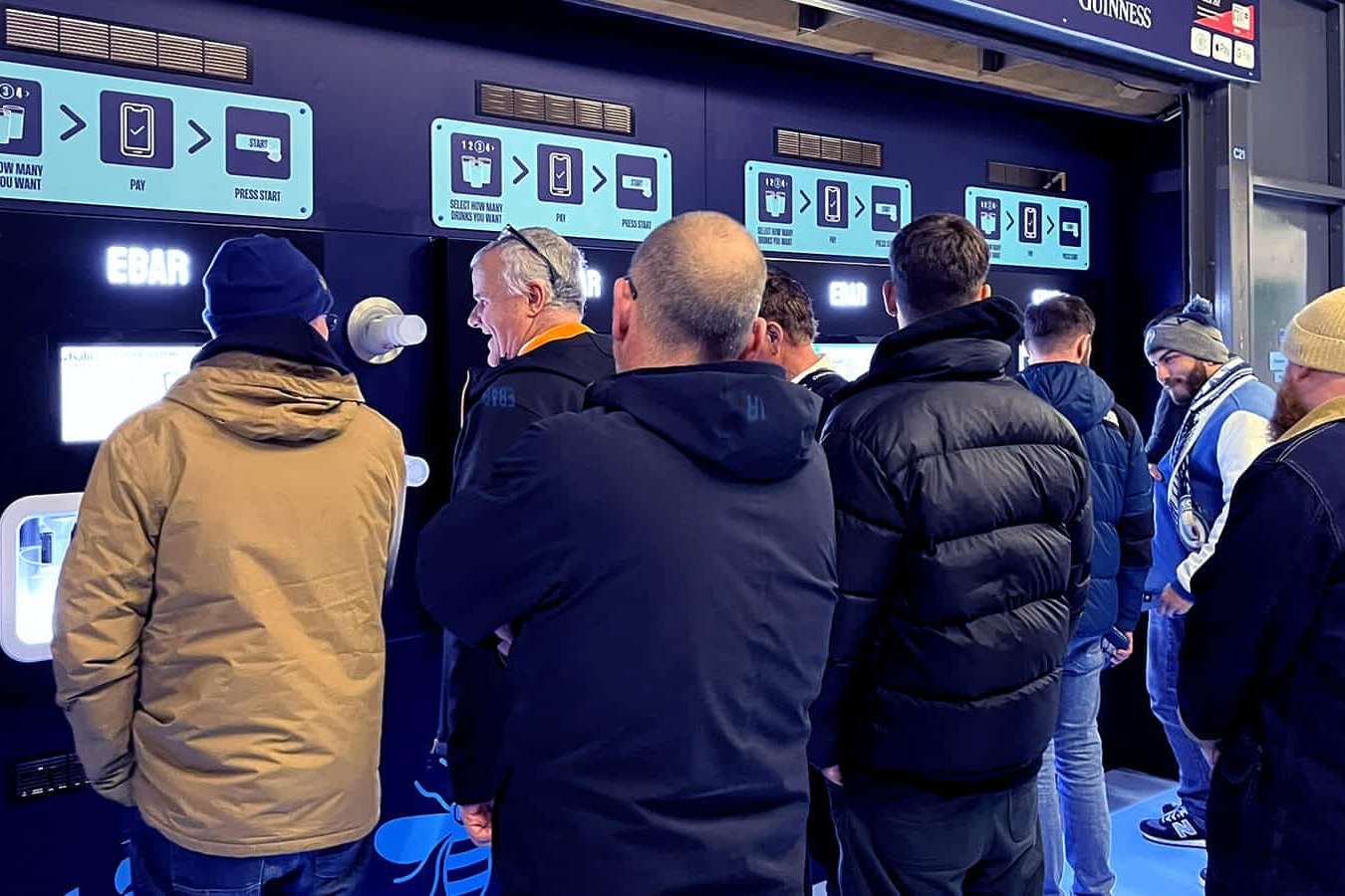 Football fans making use of a built-in self-serve Beerwall