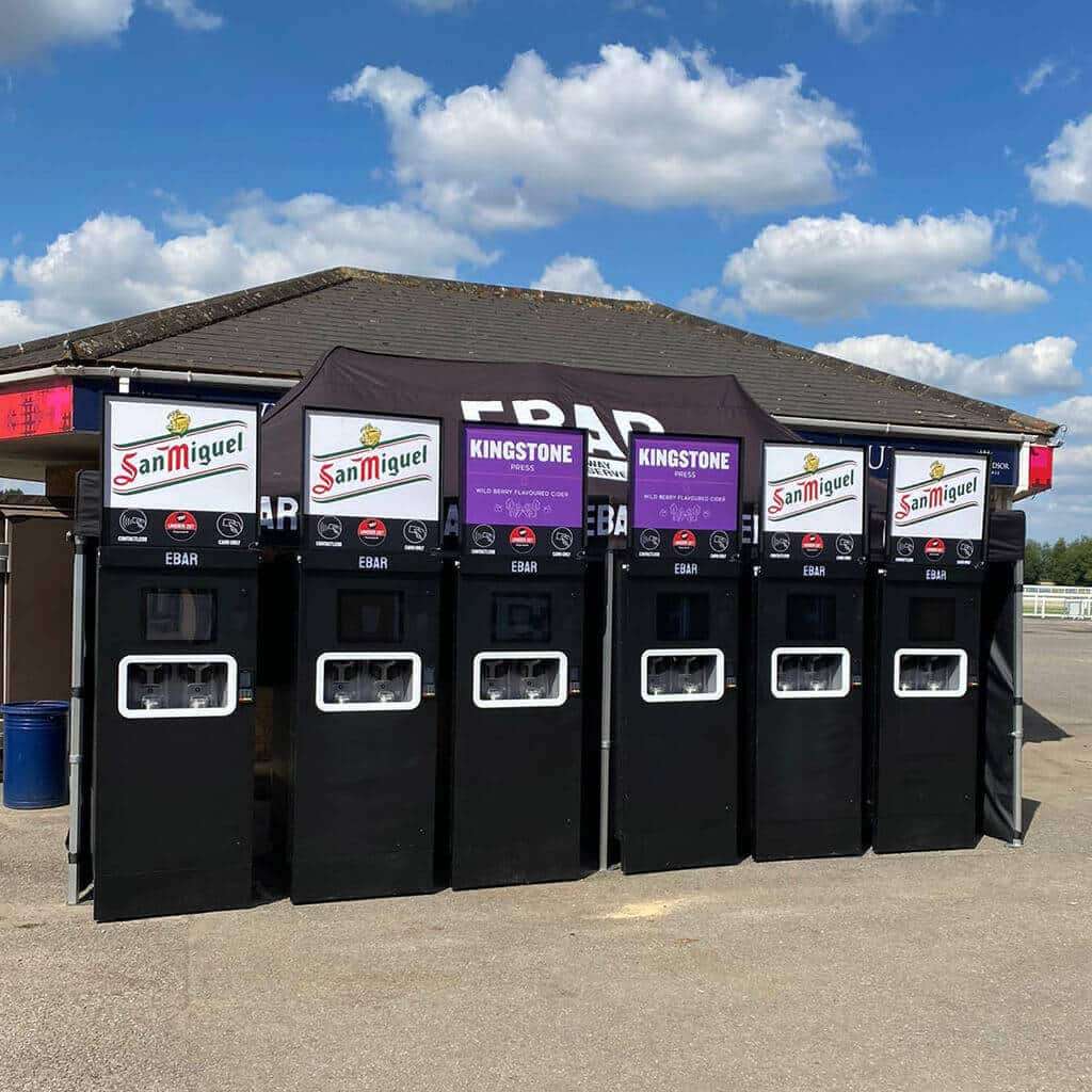 Six mobile EBar units at a racecourse, ready to pour San Miguel lager and Kingstone Press cider